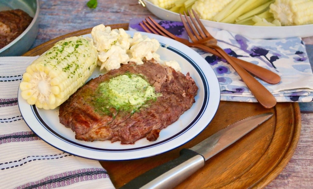 rib eye steak with corn on the cob