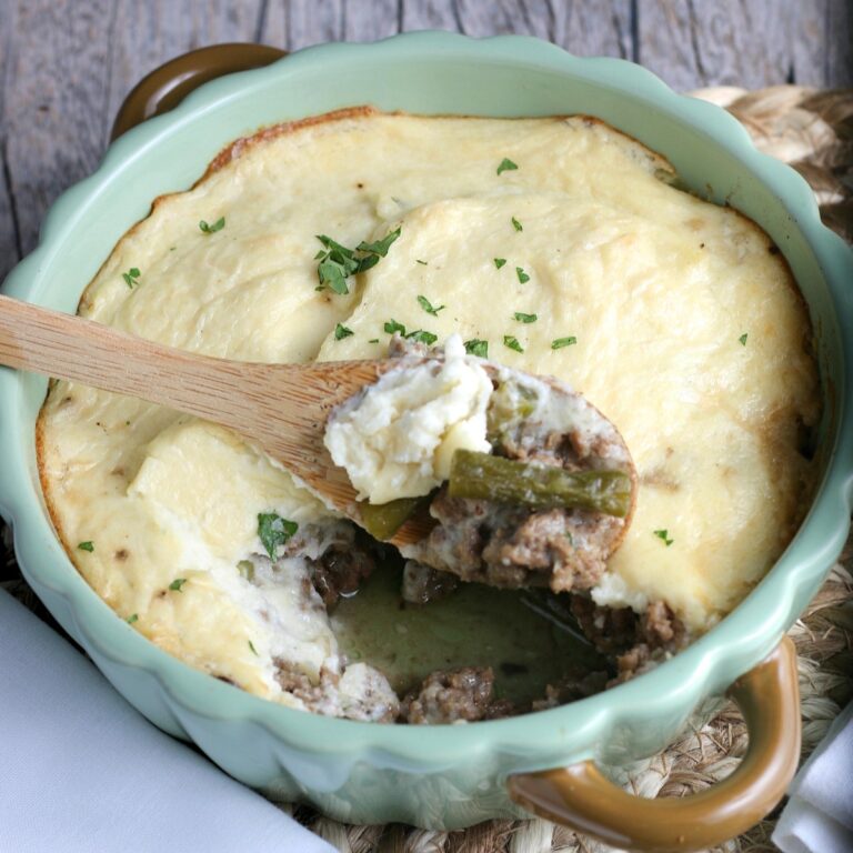 A spoonful of the cauliflower shepherds pie ready to be served.