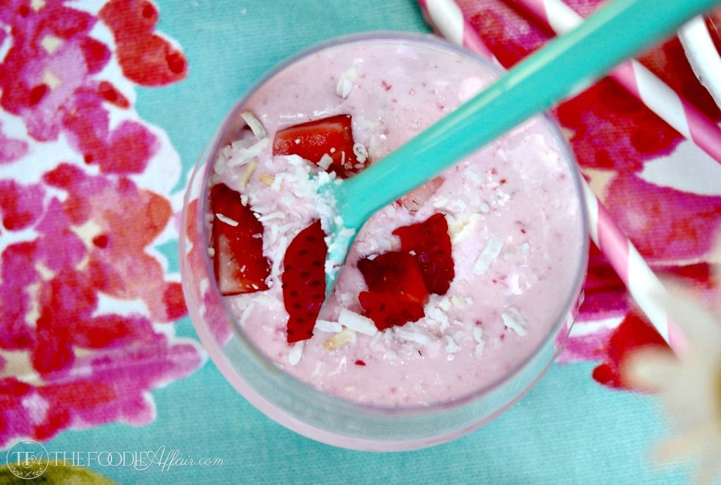 This Strawberry Coconut Smoothie made with full-fat coconut milk, strawberries, vanilla extract and a scoop of protein powder. This smoothie is an excellent breakfast, snack, pre or post workout beverage!